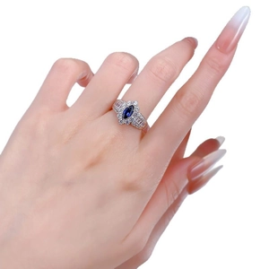 S925 silver marquise sapphire blue halo ring with side diamonds on model hand