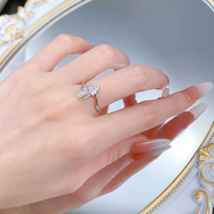 Macro shot of 925 silver ring featuring a marquise-cut gemstone in a sleek two-prong setting