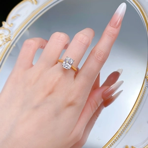 Elegant gold plated S925 silver ring featuring a large radiant cushion cut cubic zirconia