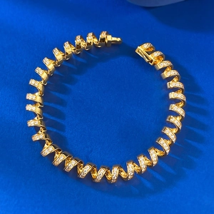 Luxurious gold-tone S925 sterling silver spiral bracelet with shimmering cubic zirconia