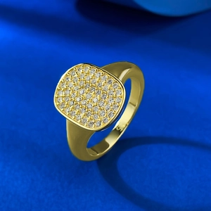 Minimalist 18K gold plated S925 silver ring with pave zircon stones on deep blue backdrop