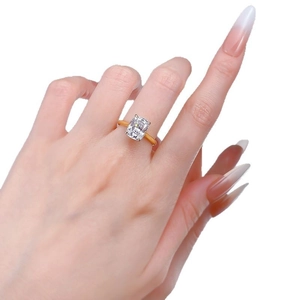Elegant 18k gold plated S925 silver ring featuring a large radiant emerald-cut cubic zirconia