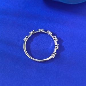 Detail view of S925 silver ring featuring seven round-cut zircons in a claw setting