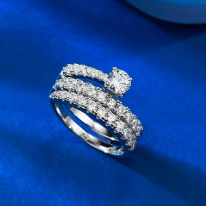 S925 sterling silver multi-layer spiral ring with zircon stones on a blue silk background