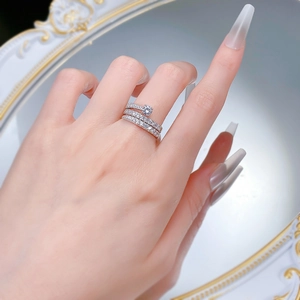 Close-up of S925 sterling silver triple-layered stackable rings with brilliant cubic zirconia