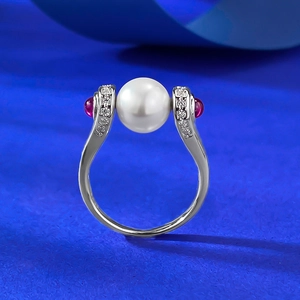 Elegant S925 silver ring featuring a large white pearl and pink gemstones on a blue backdrop