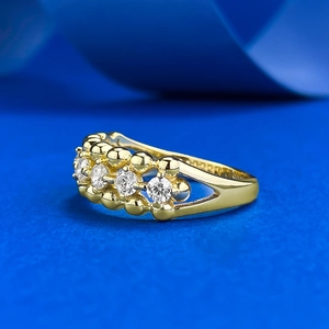 S925 sterling silver gold plated ring featuring four stones and beaded openwork design