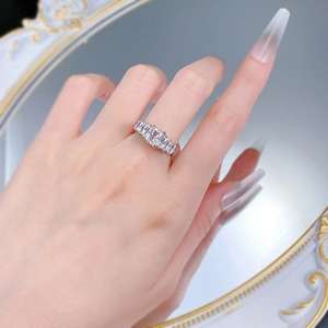 Detail of S925 silver ring featuring five rectangular cut white zircon stones on a hand