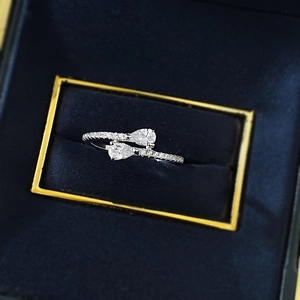 S925 silver open ring featuring dual pear-cut stones on deep blue velvet box