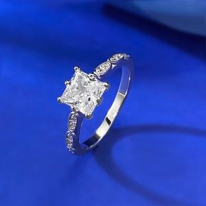 Macro shot of S925 sterling silver stamp and princess cut diamond setting detail