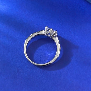 Detail view of silver ring with 6mm square white zircon in a secure six-prong setting