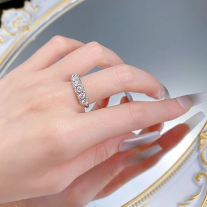 Close-up of S925 sterling silver hollow eternity ring with sparkling white zircons