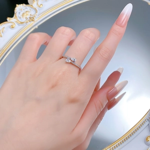 Detailed view of S925 silver double pear-shaped drop ring with pavé micro-zirconia stones