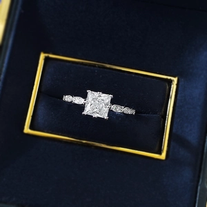 Elegant S925 silver princess cut square diamond ring displayed in a luxury blue velvet box