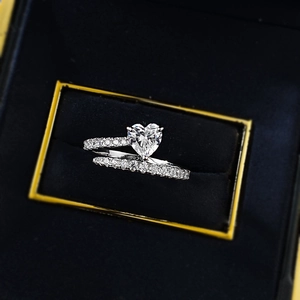 Elegant S925 sterling silver ring featuring a 6x6mm heart-shaped stone and pavé setting