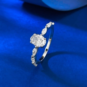 Macro shot of S925 hallmark on the polished silver band of an oval gemstone ring