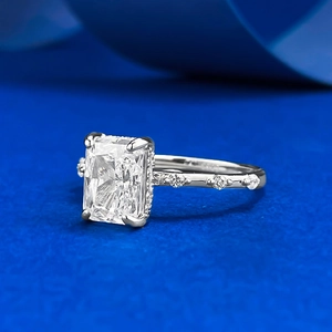 Elegant S925 silver ring with 6x8mm radiant cut diamond on premium blue velvet background