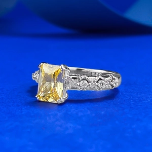 Elegant S925 silver ring featuring 6x8mm rectangle yellow cz center stone with side accents
