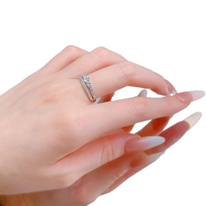 Elegant double-layered S925 silver ring featuring a round solitaire and pavé diamond band