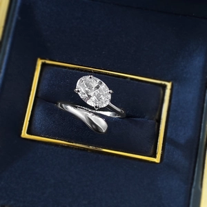 Minimalist S925 sterling silver open ring with oval clear gemstone in a blue velvet box