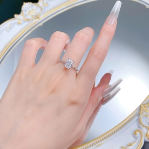 S925 silver ring featuring ice-cut rectangular zircon worn on a hand over a mirror