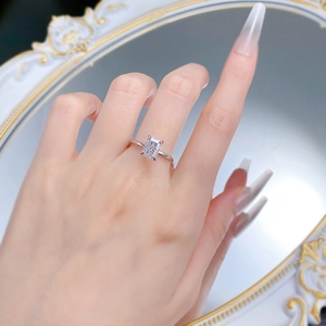 Detail of S925 silver ring featuring a 6x8mm rectangle ice flower cut stone on finger