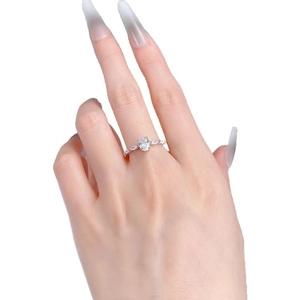 Elegant S925 silver ring featuring 5x7mm oval cut gemstone on a female hand model