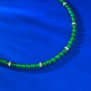 Green chalcedony beaded necklace featuring silver spacer beads with zircon micro-inlays