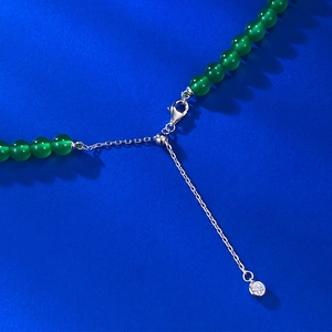 Green chalcedony bead necklace with silver lobster clasp and adjustable zircon pendant