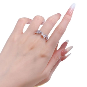 Elegant S925 silver ring featuring marquise and rectangular cut stones on model hand