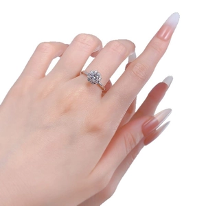 Classic S925 sterling silver ring with flower-shaped diamond halo on hand
