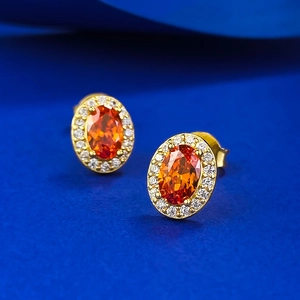 Eleganti orecchini a lobo halo in argento 925 placcato oro con gemma arancione ovale