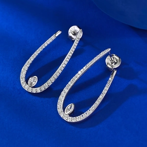 S925 silver tassel drop earrings with pavé crystals and marquise-cut stones on blue base