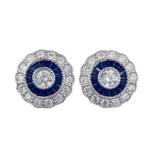 Classic 925 silver stud earrings featuring blue sapphire and white diamond halo design