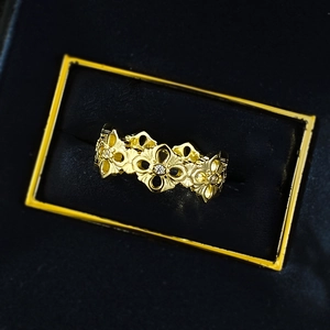 Vintage 925 sterling silver gold plated hollow floral ring with zircon accents
