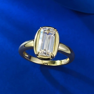 Detailed view of S925 sterling silver mark on a gold-plated emerald cut ring
