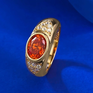 S925 gold-plated ring with sunset orange ice-cut oval gemstone and pavé accents