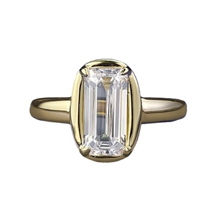 S925 silver gold-plated ring with large emerald-cut clear stone in a four-prong setting