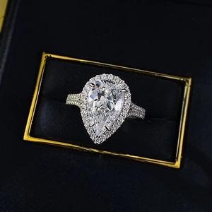 Elegant S925 silver pear-shaped halo ring with teardrop high carbon diamond in a jewelry box
