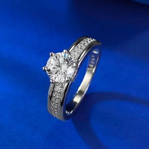 Classic S925 sterling silver 6-claw ring with 6mm round cubic zirconia on blue texture
