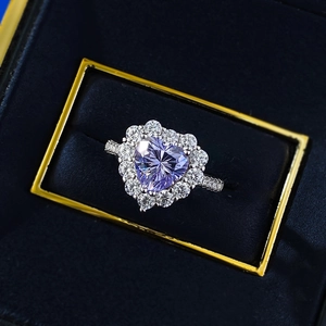 Elegant 925 sterling silver ring with a heart-cut lavender purple stone and halo diamonds