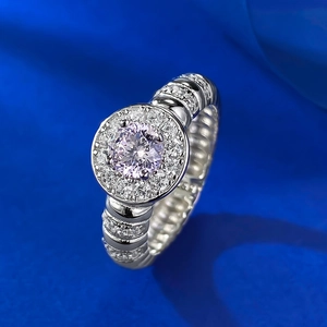 S925 silver ring featuring a 5.0mm round pink gemstone in a halo setting on blue silk