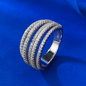 S925 sterling silver ring with five rows of sparkling cubic zirconia on a blue background