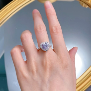 Close-up of heart-shaped lavender high carbon diamond ring in 925 sterling silver