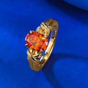 S925 silver ring featuring oval orange gemstone with multi-layered gold twisted band