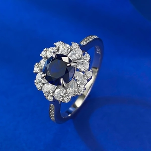 Elegant S925 silver ring featuring a 6.0mm blue corundum center and halo diamond setting