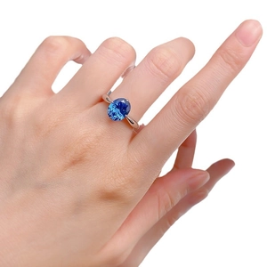 Elegant S925 silver ring featuring a large oval royal blue gemstone on a model hand