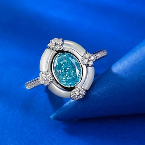 Elegant S925 silver ring with 6x8mm oval blue gemstone on a blue jewelry display cone