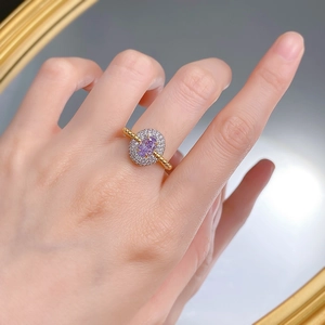 Macro detail of S925 gilded ring featuring a purple ice flower cut high carbon diamond