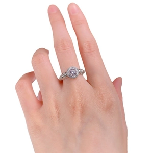 S925 silver ring with 5mm pink diamond and round cut stones shown on female hand
